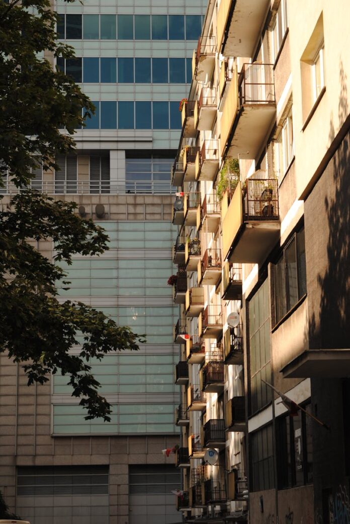 Explore the urban aesthetics of Warszawa with this modern apartment facade.